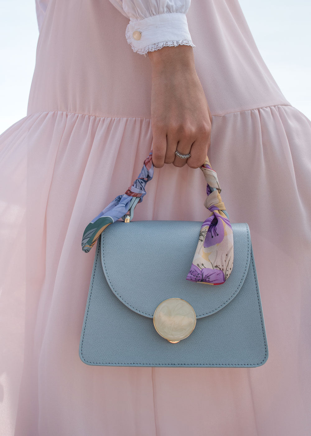 Women mini leather handle purse in blue-sky premium leather